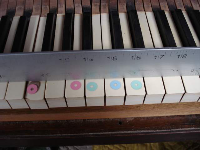 23 - White key heights regulated. 23 - White key heights regulated.